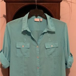 Kim Rogers’s, beautiful button down , rolled sleeves